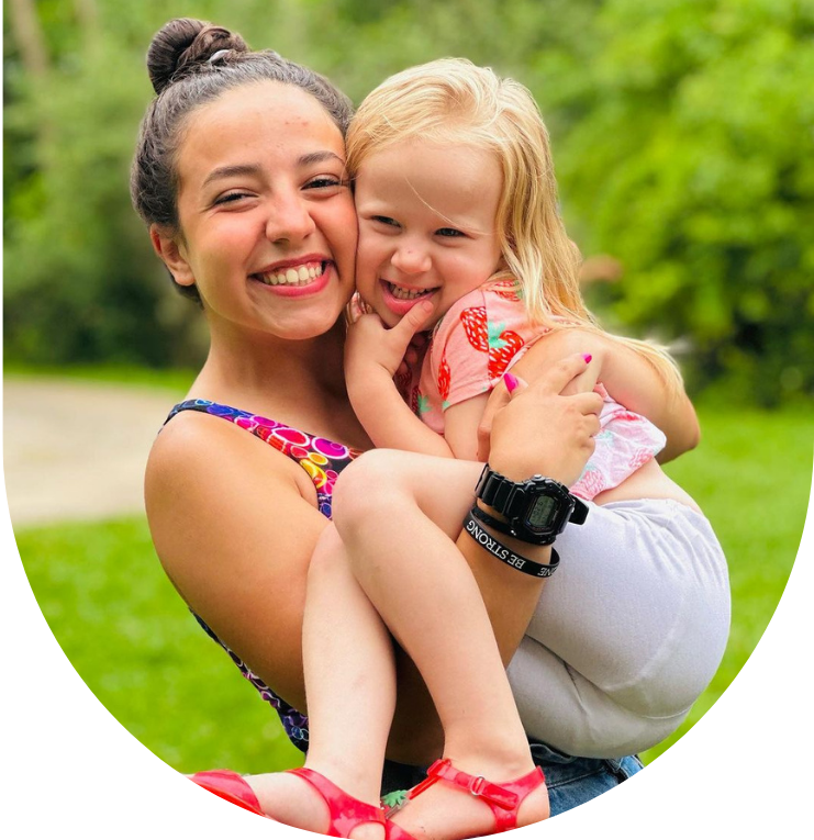 Au pair and child smiling